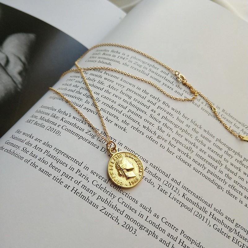 Two coins of the same necklace - AXHEA